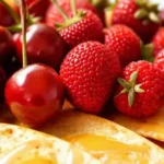 Dulces frutas y tortillas cálidas brillan