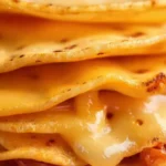 Queso derretido y jamón apetecibles