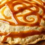 Una tortilla dorada y tentadora brilla